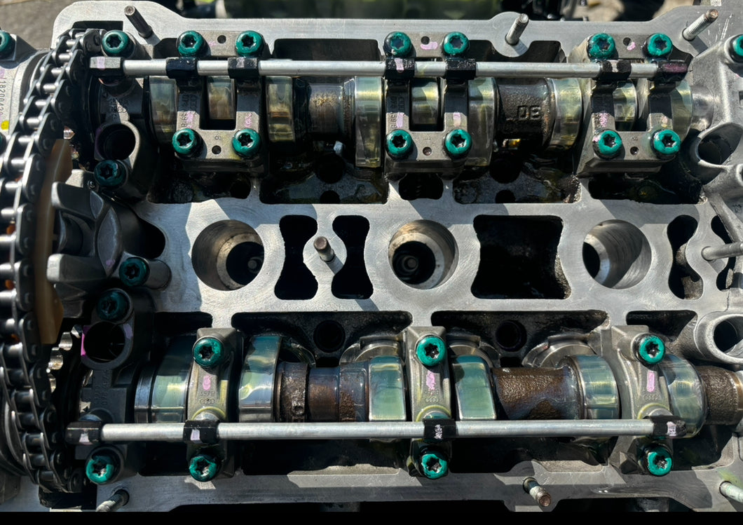 2.8 cylinder heads rebuilt with upgraded exhaust valves/ guides with new cam chain tensioners assembled for 2.7 application