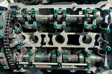 Load image into Gallery viewer, 2.8 cylinder heads rebuilt with upgraded exhaust valves/ guides with new cam chain tensioners assembled for 2.7 application